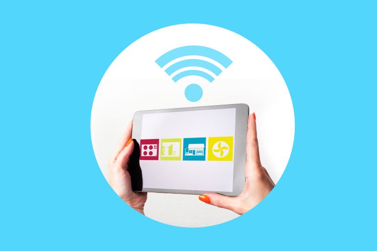 Smart home control app for tablet. Tablet computer with a smart home control panel in human hands. IOT system remote monitoring application concept. Mobile applications for smart home automation