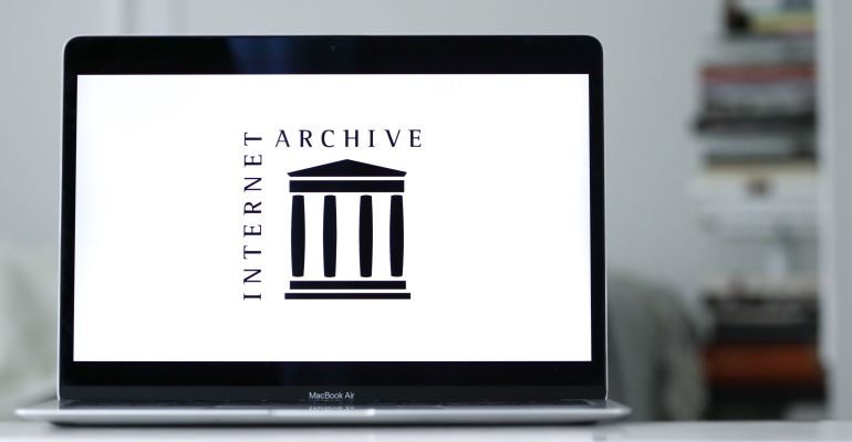 NEW YORK, US - Sep 24, 2022: A logo design of Internet Archive on a laptop screen in blurred background