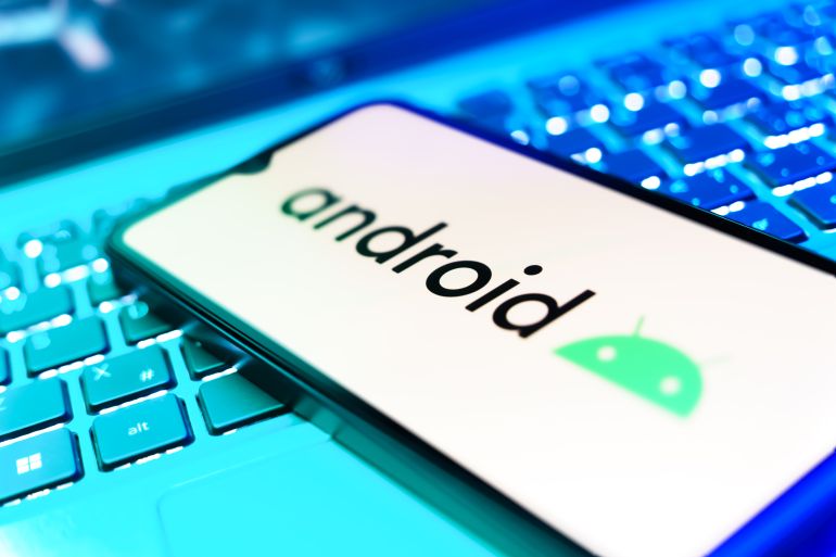Prague, Czechia - 7 20 2024: Smartphone on surface showing Android logo. Android is a mobile operating system based on the Linux kernel.