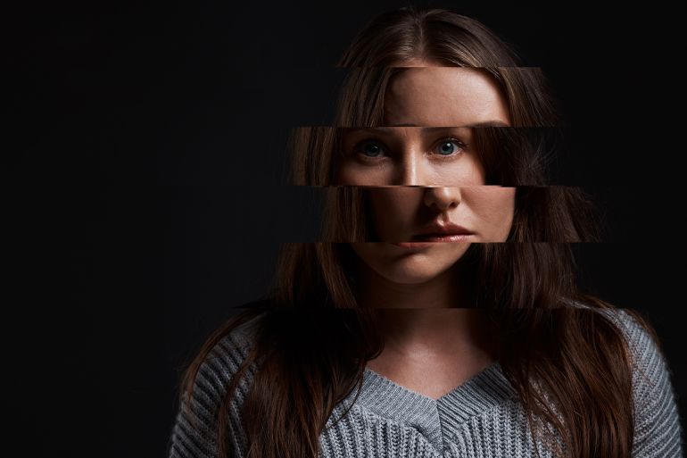 shutterstock_2568554839-1774719658 Fear, bipolar disorder and identity with portrait of woman in studio for mental health, psychology and trauma trigger. Depression, schizophrenia and ptsd with person on black background for mockup; Shutterstock ID 2568554839; purchase_order: aj; job: ; client: ; other: