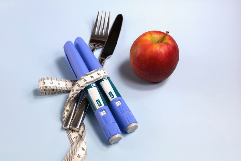 Concept of losing weight with Ozempic. High quality photo; Shutterstock ID 2652578671; purchase_order: aj; job: ; client: ; other: