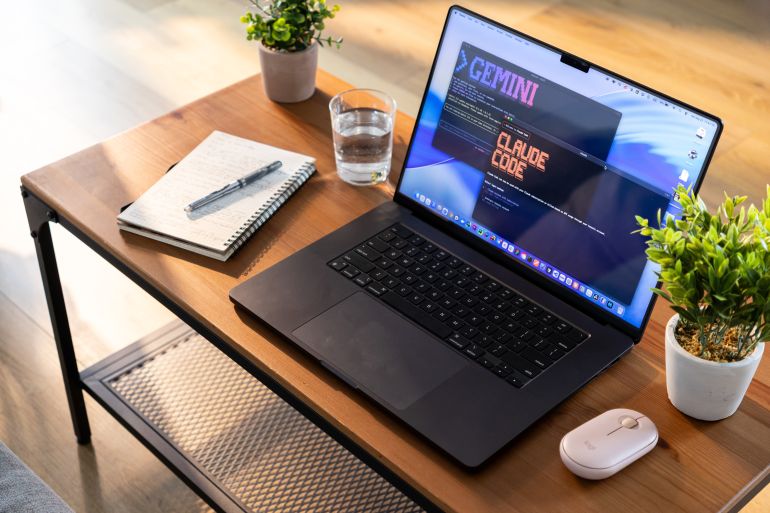 Poznan, Poland - August 23, 2025: Laptop screen shows GEMINI and CLAUDE CODE, illustrating cutting-edge artificial intelligence development and innovative coding solutions