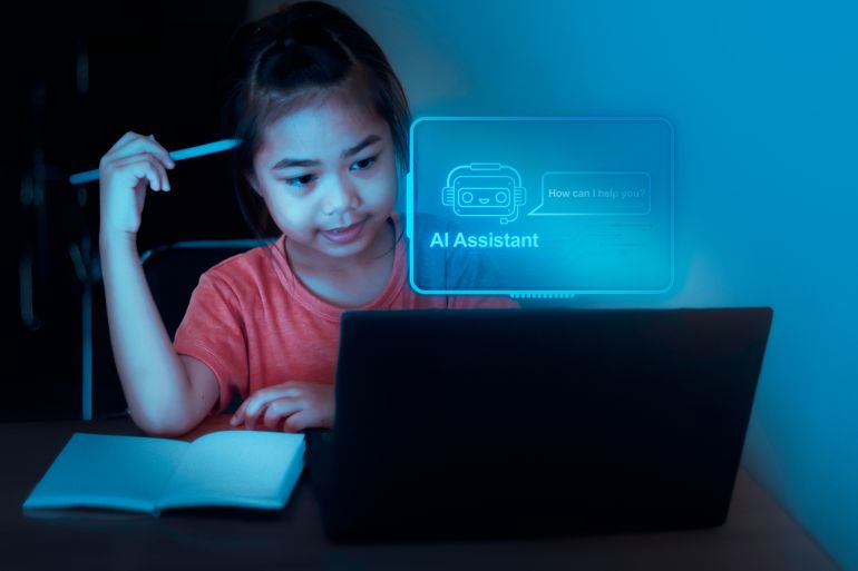 Young girl interacts with an AI assistant on a laptop while studying at a desk in a cozy indoor space