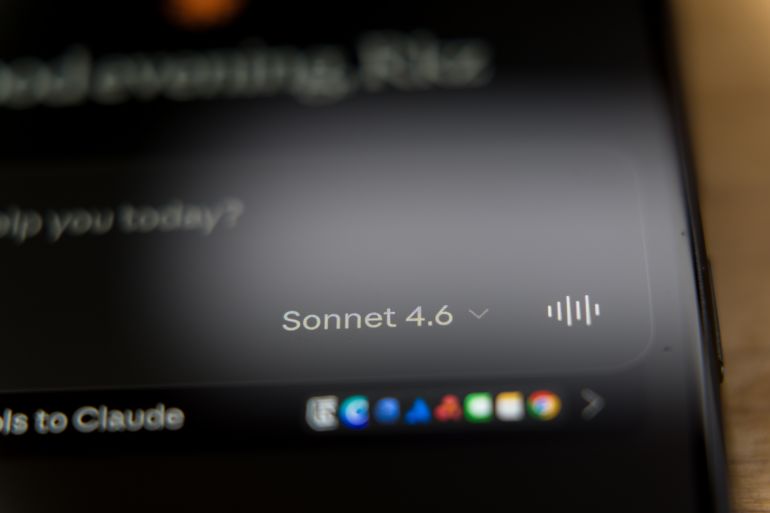 Claude Sonnet 4.6 mobile application interface on a smartphone screen, featuring a personalized greeting and tool access for advanced AI conversational reasoning and digital assistance. Kaunas, Lithuania - 2026 February 18