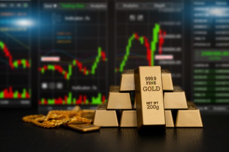 Digital gold price stock market trading charts with stacked fine gold bars, Financial wealth management, trader, precious metal commodity investment, forex and inflation safe haven concept