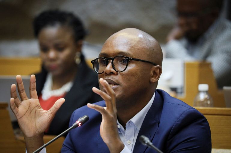 solly-malatsi-1777458885 Minister of Communications and Digital Technologies Solly Malatsi gestures while briefing the Communications Committee on his proposed draft policy, which includes alternatives to Black ownership requirements, emphasizing that the policy is not solely intended for Elon Musk's Starlink, in Parliament, Cape Town, South Africa, May 27, 2025. REUTERS/Sumaya Hisham.