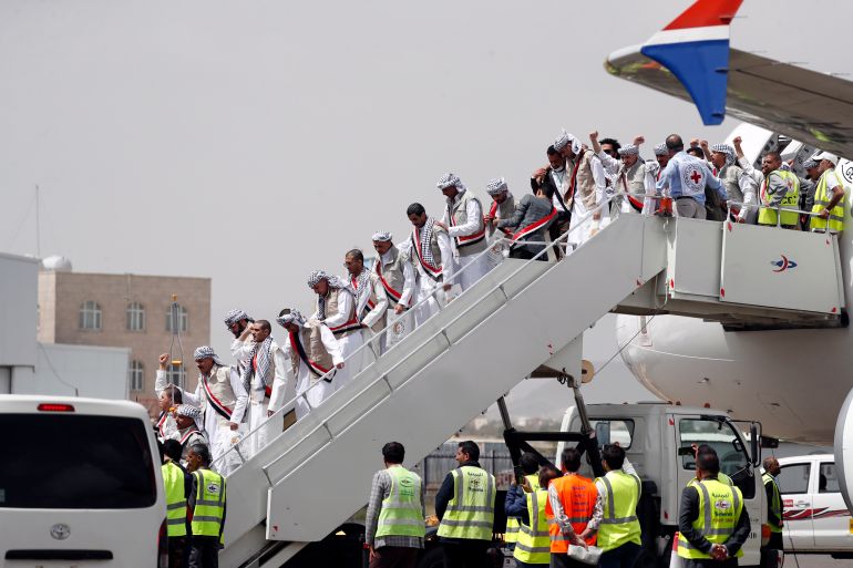 11414329 epa10573338 Freed Houthi prisoners disembark from an ICRC-chartered plane at Sana'a Airport on the second day of a prisoner swap in Sanaa, Yemen, 15 April 2023. Yemen's warring parties began on 14 April a three-day exchange of 887 prisoners. The Houthis have agreed to release 181 detainees, including Saudis and Sudanese soldiers who fought alongside Yemeni government forces, in exchange for 706 prisoners held by the Yemeni government, under the UN and ICRC-brokered prisoner swap deal reached last March in Switzerland. EPA-EFE/YAHYA ARHAB