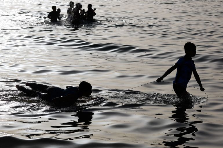 456yrtdf-1778670530 Palestinian children play in the water during a hot day in Gaza City, May 12, 2026. REUTERS/Mahmoud Issa TPX IMAGES OF THE DAY