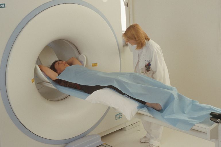 Photo Essay From Hospital. Department Of Nuclear Medicine Of The Gustave Roussy Institute, In The French Region Of Ile De France. Exploration With Positron Emission Tomography Pet. Pet Scan. Cancer Diagnosis. Functional Imagery Technique To Detect Cancer And Follow Its Evolution. In A Pet Scan, The Patient Receives An Intravenous Injection Of Radioactive Isotopes, Creating Contrast Tracers That Are Detected By The Pet Scanner. The Radioactive Tracer Is Often 18 Fluorodeoxyglucose 18 Fdg Which Has A Chemical Composition Which Is Very Similar To Glucose, However, Yet Is Radioactive And Thus Can Be Detected Using Nuclear Medicine Equipment. Cancer Cells, Which Have A Higher Metabolism Than Normal Cells, Absorb More Glucose. The 18 Fdg, However, Is Not Metabolized Like Glucose And Remains In The Cell Whether Cancerous Or Not For A Longer Time. The More Aggressive The Cancerous Cells, The More They Capture And Retain 18 Fdg. The 18 Fdg Atoms Emit Positrons As Part Of The Normal Radioactive Disintegration Process. Rapidly Contacting Electrons In The Body, Two Photons Or Light Particles Are Emitted In Diametrically Opposed Directions 180 Degrees. A Tomogram Of The Positron Emission, Coupled With A Cat Scan Produces The Image Known As A Pet Scan Allowing The Radiologist To Precisely Locate The Site Of The Emission And Thus The Tumor. (Photo By BSIP/UIG Via Getty Images)