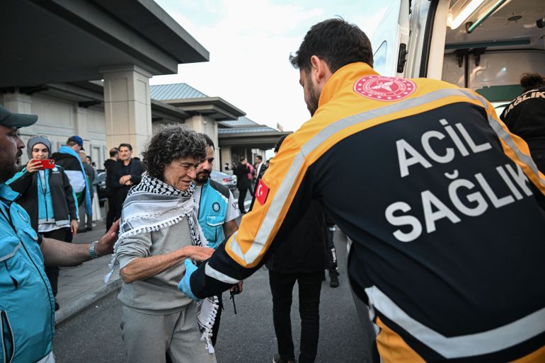 ISTANBUL, TURKIYE - MAY 21: Injured activists from the Global Sumud Flotilla, who were detained by Israel in international waters, are being immediately transferred to standby ambulances at Istanbul Airport in Istanbul, Turkiye on May 21, 2026. Three planes carrying activists from the Global Sumud humanitarian aid flotilla, detained earlier this week by Israel in international waters, arrived in Istanbul on Thursday. Three Turkish Airlines planes transporting the activists who were detained aboard the flotilla, which came under attack by the Israeli army in international waters while attempting to break the blockade on Gaza and deliver vital humanitarian aid, landed at Istanbul Airport. The activists were welcomed at the airport’s VIP Hall by their relatives and numerous officials. ( Saffet Azak - Anadolu Agency )