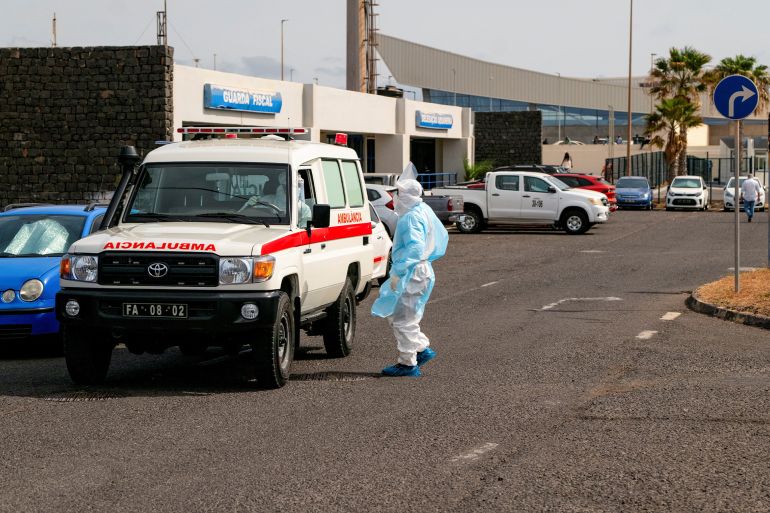 651498-1778150159-1 A person in protective clothing stands next to an ambulance during an evacuation operation of suspected hantavirus patients, following an outbreak on the cruise ship MV Hondius, in Praia, Cape Verde, May 6, 2026. REUTERS/Danilson Sequeira