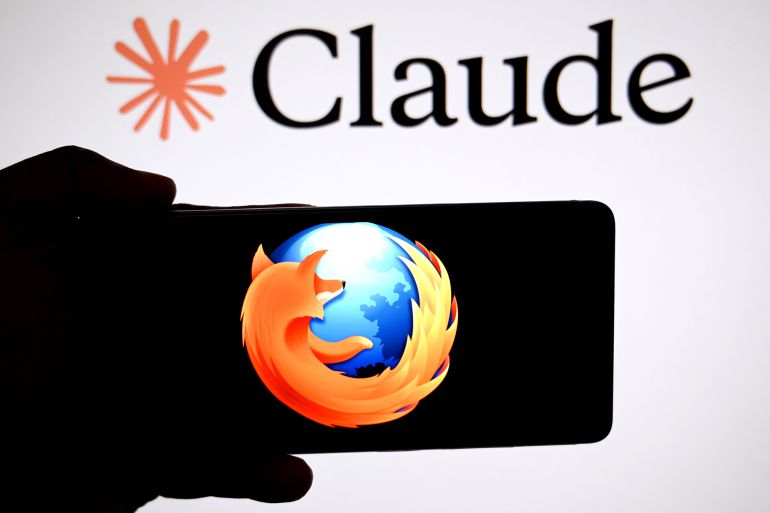 6547lb-1779106650 INDIA - 2026/05/06: In this photo illustration, a Mozilla Firefox logo is seen displayed on a smartphone with a Claude mythos logo in the background. (Photo Illustration by Avishek Das/SOPA Images/LightRocket via Getty Images)
