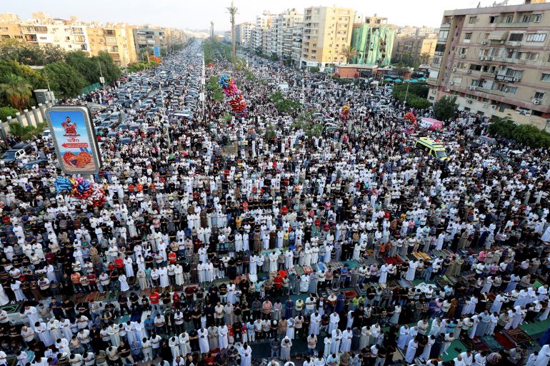 Muslims attend an Eid al-Adha prayer at a public park, outside El-Seddik Mosque in Cairo, Egypt, May 27, 2026. REUTERS/Mohamed Abd El Ghany