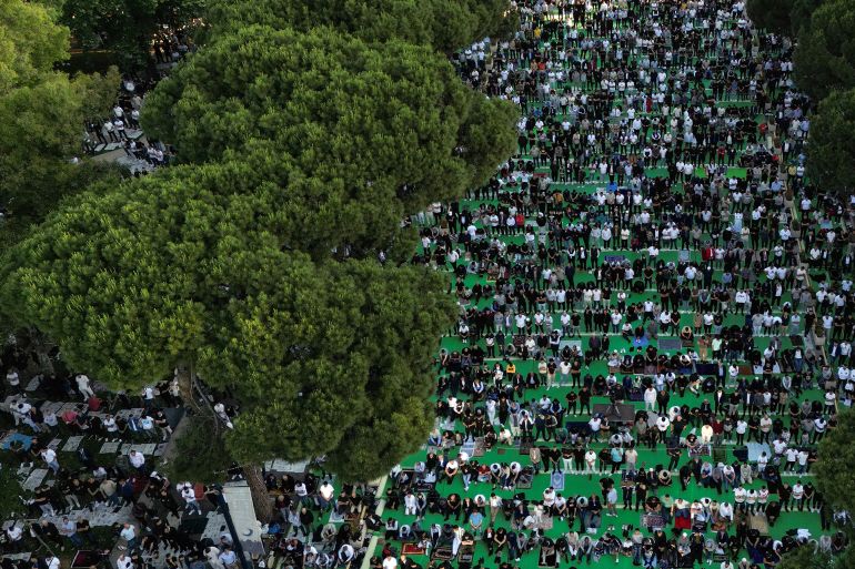 A drone view shows Albanian Muslims attending morning prayers during Eid al-Adha celebrations at the main boulevard, in Tirana, Albania, May 27, 2026. REUTERS/Florion Goga