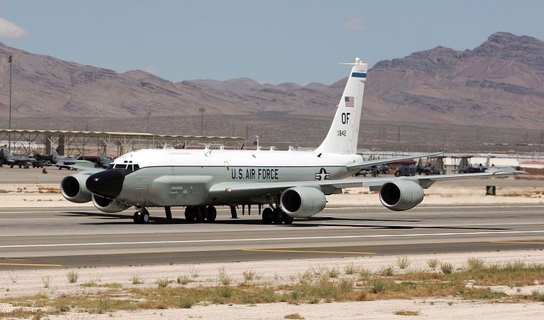 Air Force Holds Joint Expeditionary Force Experiment 2006 NELLIS AFB, NV - APRIL 25: A United States Air Force RC-135 RIVET JOINT aircraft takes off from Nellis Air Force Base while participating in the Joint Expeditionary Force Experiment 2006 (JEFX 06) April 25, 2006 in Las Vegas, Nevada. JEFX is a biannual test of new systems and technologies by every branch of the military in an attempt to speed their introduction into the modern battlefield. This year's tests involve about 1,400 personnel from the United States, Great Britain, Canada and Australia studying new technologies during mock combat over the Nevada desert and center on finding better ways to communicate critical information between armed forces. (Photo by Ethan Miller/Getty Images)