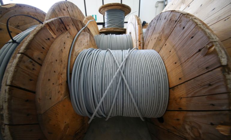 Reels of optical fiber cables are seen in a storage area in Perugia, Italy, June 23, 2017. Picture taken June 23, 2017. REUTERS/Alessandro Bianchi