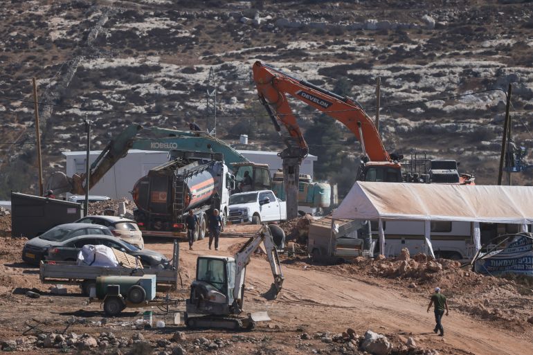 afp_690548ead3ed-1761954026 This photograph shows heavy machinery at a new Israeli settlement outpost near the settlements of Kiryat Arba'a and Kharsina, on the outskirts of the Palestinian city of Hebron in the Israeli-occupied West Bank on October 30, 2025.