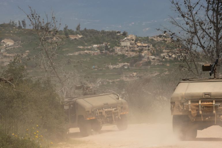 Israeli army soldiers patrol in their humvees along the border with southern Lebanon, in the Upper Galilee of northern Israel on April 17, 2026.