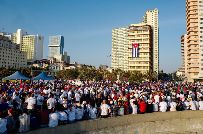 People take part in an event marking International Workers’ Day at the Anti‑Imperialist Platform in front of the US Embassy in Havana on May 1, 2026. (Photo by ADALBERTO ROQUE / AFP)