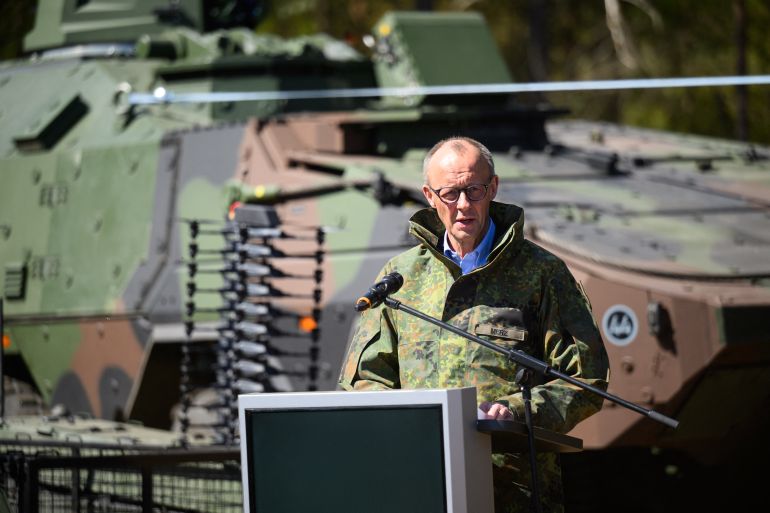German Chancellor Friedrich Merz addresses journalists during his visit to the German army barracks in Munster, northern Germany, on April 30, 2026.