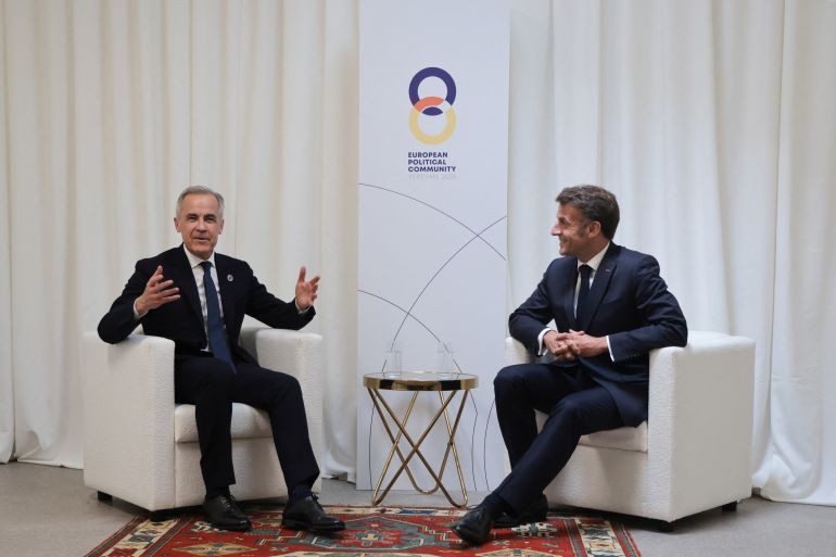 France's President Emmanuel Macron and Canada's Prime Minister Mark Carney hold a meeting on the sidelines of the 8th European Political Community (EPC) summit in Yerevan on May 4, 2026. (Photo by Ludovic MARIN / AFP)