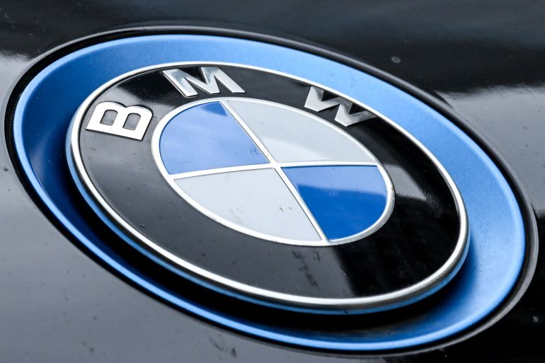 A logo of German automotive brand BMW is pictured on BMW car in Frankfurt am Main, western Germany, on May 5, 2026.