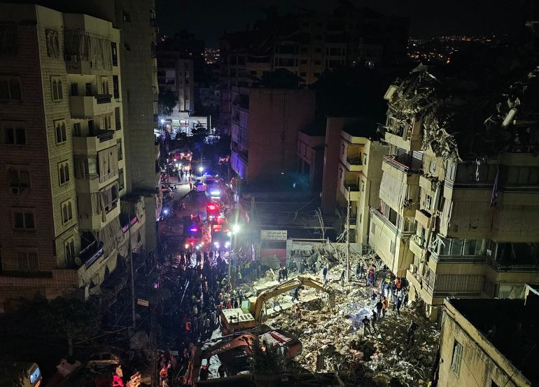 First responders gather at the site of an Israeli airstrike in Beirut’s southern suburb of Haret Hreik neighborhood on May 6, 2026.