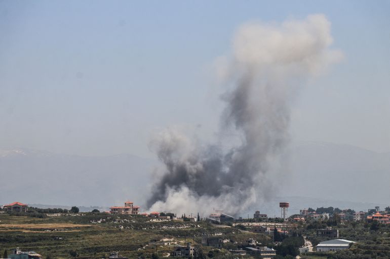Smoke rises from the site of an Israeli airstrike that targeted the southern Lebanese village of al-Halloussiyah on May 8, 2026.
