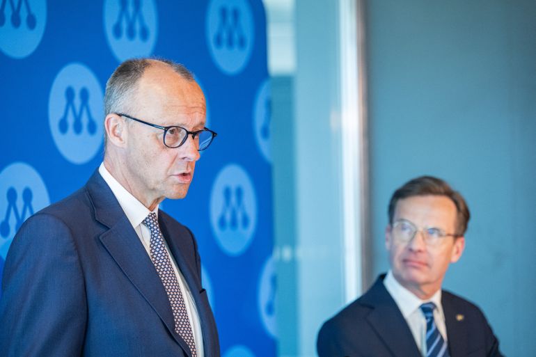 German Chancellor and Chairman of Germany's conservative Christian Democratic Union (CDU) party Friedrich Merz (L) speaks during a press conference with Sweden’s Prime Minister Ulf Kristersson during Sweden's Moderate party's convention on May 9, 2026 in Stockholm. (Photo by Jonathan NACKSTRAND / AFP)