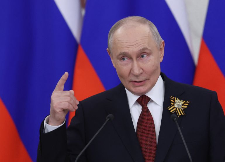 Russian President Vladimir Putin talks to the media following his meetings with foreign delegations at the Kremlin in Moscow on May 9, 2026. (Photo by MAXIM SHIPENKOV / POOL / AFP)