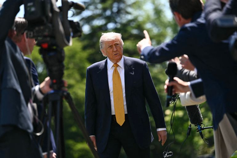 afp_6a040f8a15bb-1778651018 US President Donald Trump speaks to the press before walking to board Marine One as he departs from the South Lawn of the White House in Washington, DC, on May 12, 2026.