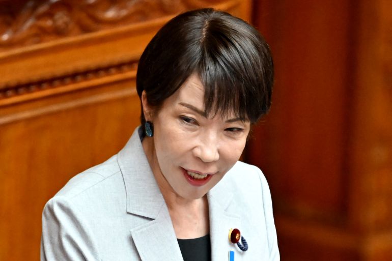 afp_6a058fb1dd5c-1778749361 Japan's Prime Minister Sanae Takaichi answers questions regarding the bill to establish the National Intelligence Council during a House of Councillors plenary session at the parliament in Tokyo on May 8, 2026.