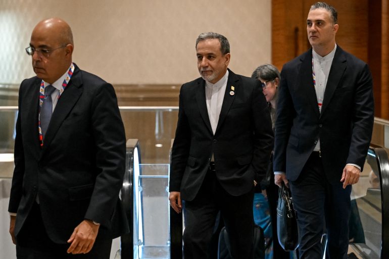 Iran's Foreign Minister Abbas Araghchi (C) arrives to attend the BRICS Foreign Ministers’ meeting at the Bharat Mandapam in New Delhi on May 14, 2026.