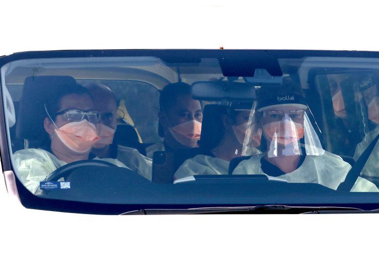 A bus carrying medical officials and members of the flight crew of the plane that transported the passengers caught up in the MV Hondius hantavirus outbreak, arrives at a purpose-built quarantine facility located on the outskirts of the Western Australian city of Perth on May 15, 2026.