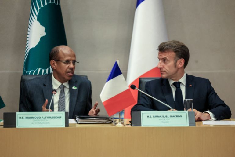 France's President Emmanuel Macron (R) attends a trilateral meeting with United Nations' Secretary-General Antonio Guterres and African Union Commission's President Mahamoud Ali Youssouf (L) at the African Union (AU) headquarters in Addis Ababa on May 13, 2026. (Photo by Ludovic MARIN / AFP)