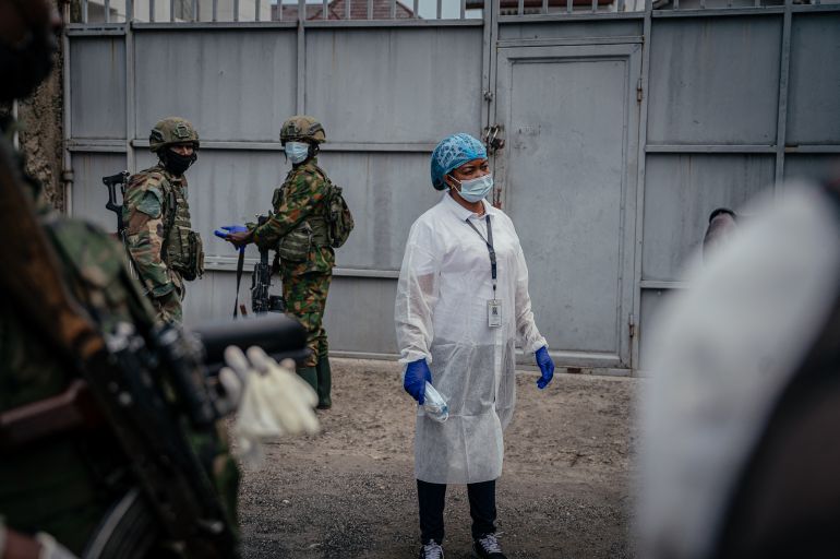 afp_6a0d70c906a4-1779265737 A health worker monitors visitors arriving at the Rodolphe Mérieux Laboratory, National Biomedical Research Institute (INRB) in Goma, on May 19, 2026.