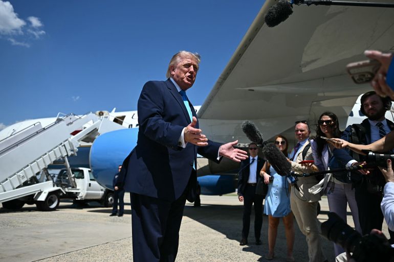 afp_6a0e41cfecfb-1779319247 US President Donald Trump speaks to reporters after stepping off Air Force One at Joint Base Andrews, Maryland on May 20, 2026, as he returns to Washington, DC, after delivering the commmencement address to the US Coast Guard Academy's 2026 graduating class.