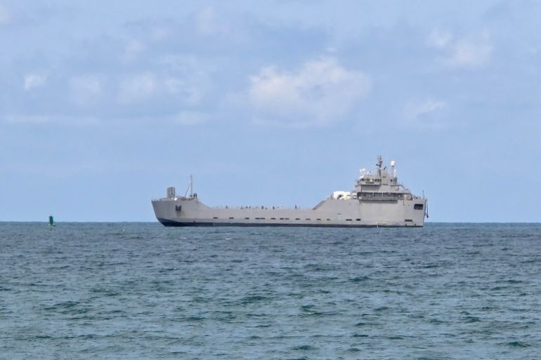 afp_6a0ed7f8a32a-1779357688 TOPSHOT - An Israeli naval vessel is motored towards the Israeli port of Ashdod, about 40 kilometres south of Tel Aviv, on May 20, 2026, after Israeli forces intercepted the Gaza-bound Global Sumud Flotilla.