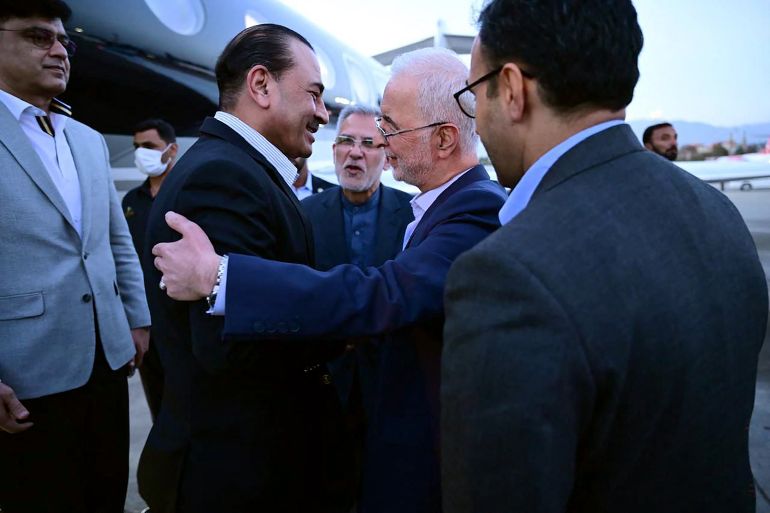 This handout photograph taken and released on May 22, 2026 by Pakistan's Inter-Services Public Relations (ISPR) shows visiting Pakistan’s Army Chief Syed Asim Munir (2nd L) being greeted by Iran’s Interior Minister Eskandar Momeni upon his arrival in Tehran as part of ongoing mediation efforts between Iran and the United States. (Photo by HANDOUT / Inter-Services Public Relations / AFP) / RESTRICTED TO EDITORIAL USE - MANDATORY CREDIT "AFP PHOTO/INTER-SERVICES PUBLIC RELATIONS" - HANDOUT - NO MARKETING NO ADVERTISING CAMPAIGNS - DISTRIBUTED AS A SERVICE TO CLIENTS