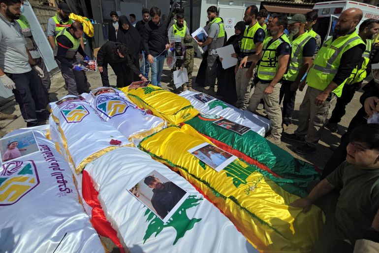 Relatives mourn over the bodies of victims killed in the Israeli strike on the southern village of Deir Qanoun al-Nahr, outside Jabal Amel Hospital in the Tyre area of south Lebanon, before the bodies were transferred to their hometown for burial, as security conditions prevented families from holding the farewell ceremony in the village, on May 21, 2026.