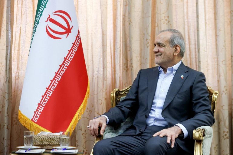 afp_6a14afa4d6f2-1779740580 In this handout picture provided by the Iranian presidency, Iran's President Masoud Pezeshkian looks on during a meeting with Pakistan’s army chief in Tehran on May 23, 2026.