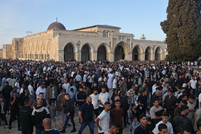 Muslim devotees gather at the Al-Aqsa Mosque compound in Jerusalem on May 27, 2026, to mark the start of Eid al-Adha, the Feast of Sacrifice. (Photo by AHMAD GHARABLI / AFP)