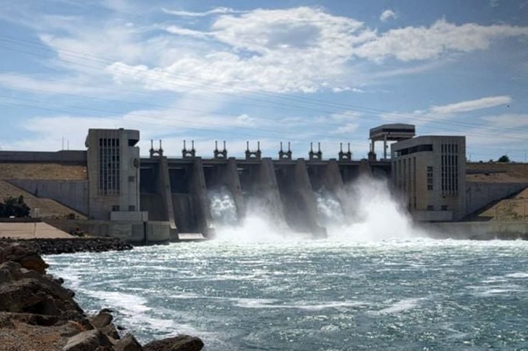 This handout picture released by the official Syrian Arab News Agency (SANA) on May 28, 2026, shows water being released from the Euphrates Dam in Tabqa in Raqa province as water levels rise along the Euphrates River.