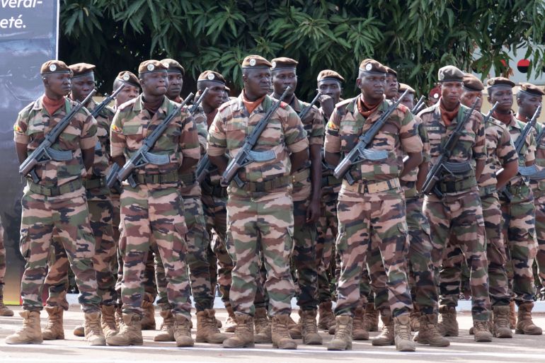 ap_69f6ebc69390d-1777789894-1 Soldiers wait for the start of the funeral for Mali's former defense minister Sadio Camara at the Military Engineering Parade Ground in Bamako, Mali, Thursday, April 30, 2026. (AP Photo/Boubacary Bocoum)