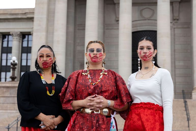 Theda Moreno, Cassandra Fraser and Tatum Escott attend an event to honor and raise awareness for Indigenous people who are missing or who have been killed, Tuesday, May 5, 2026, in Oklahoma City. (Sarah Liese/KOSU via AP)