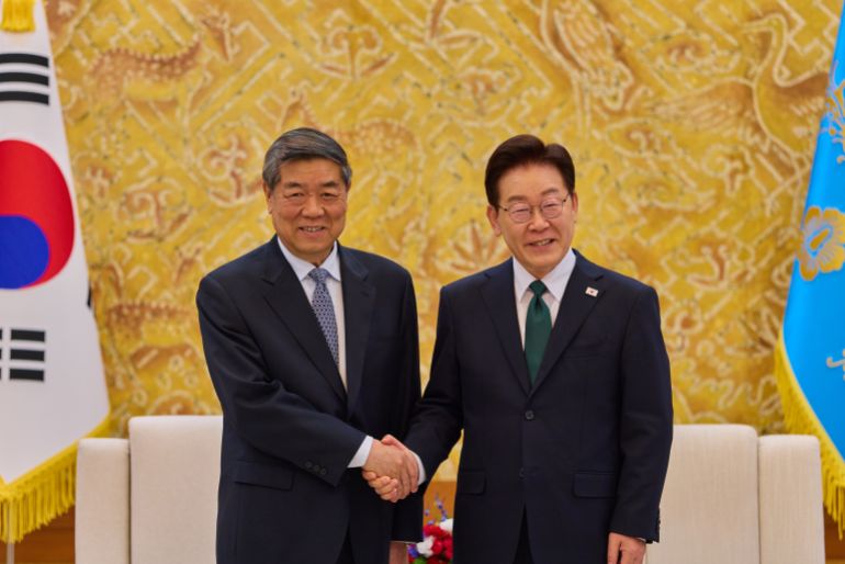 ap_6a04197e78043-1778653566 In this photo provided by South Korea Presidential Office, South Korean President Lee Jae Myung, right, shakes hands with Chinese Vice Premier He Lifeng ahead of a meeting in Seoul, South Korea, Wednesday, May 13, 2026. (South Korea Presidential Office via AP)