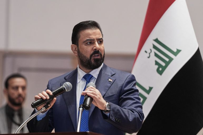 Iraq's Prime Minister-designate Ali al-Zaidi, speaks to Iraqi lawmakers before submitting his government in Baghdad, Iraq, Thursday, May 14, 2026. (Iraqi Presidency Office via AP)
