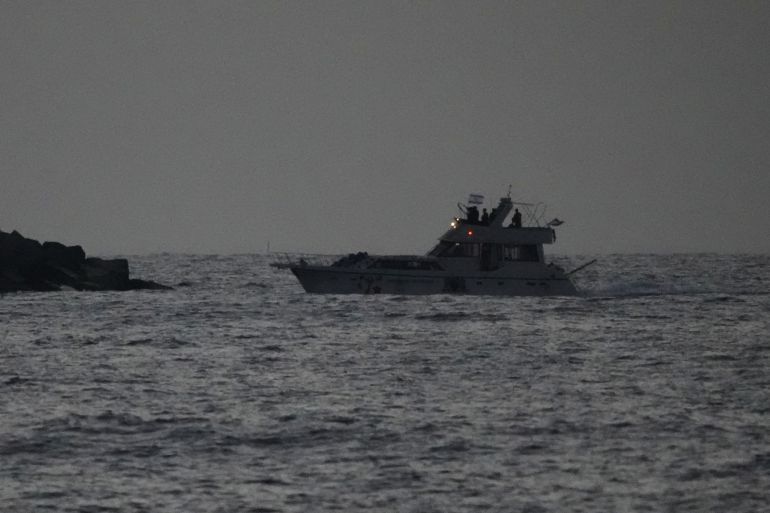 Israeli naval forces sail a confiscated Gaza-bound flotilla boat into Israel's Ashdod port after intercepting the vessel on the Mediterranean Sea, Tuesday, May 19, 2026. (AP Photo/Ariel Schalit)