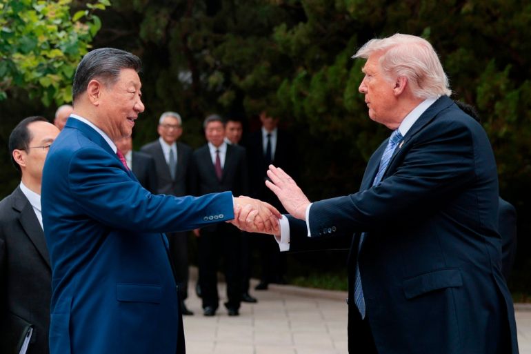 ap_6a0eef2fe8edc-1779363631 FILE - U.S. President Donald Trump, right, shakes hands with Chinese President Xi Jinping while leaving after a visit to the Zhongnanhai Garden in Beijing, Friday, May 15, 2026. (Evan Vucci/Pool Photo via AP, File)
