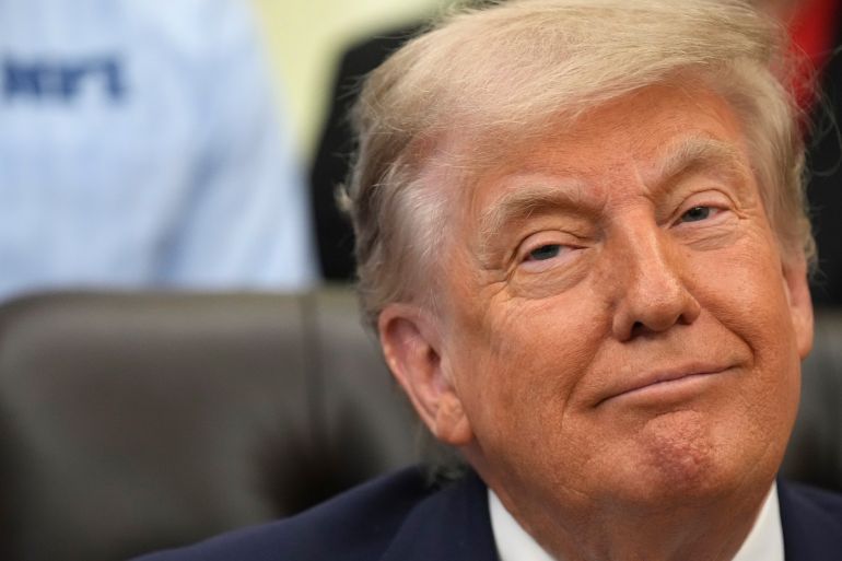 ap_6a0f32090def7-1779380745 President Donald Trump attends an event about loosening a federal refrigerant rule, in the Oval Office at the White House, Thursday, May 21, 2026, in Washington. (AP Photo/Jacquelyn Martin)